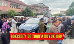 Gökçebey'de Togg ile fotoğraf çektirebilmek için birbirleriyle yarıştılar