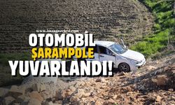 Otomobil şarompole yuvarlandı!