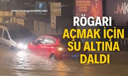 Rögarı açmak için su altına daldı! Yok artık