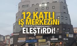 O iş merkezini eleştirdi.