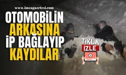 Otomobilin Arkasına İp Bağlayarak Kaydılar...