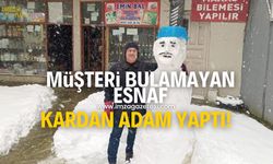 Müşteri bulamayan esnaf kardan adam yaptı