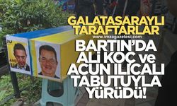 Galatasaraylı taraftarlar Fenerbahçe renklerinde hazırladığı tabuta Ali Koç ve Acun Ilıcalı'nın resmini yerleştirdi