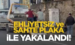 Hem ehliyetsiz hem de sahte plaka kullanırken yakalandı