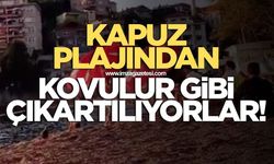Kapuz plajından "Kovulur" gibi çıkarılıyorlar
