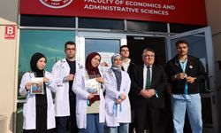 Rektör Özölçer’e Gazze için Turkuaz Kurdele...