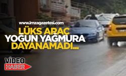 Lüks araç yoğun yağmura dayanamadı...