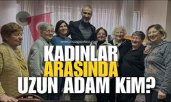 Kadınlar arasında uzun adam kim?