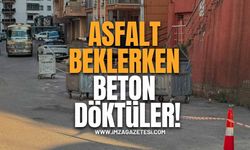 Asfalt beklerken, beton döktüler!