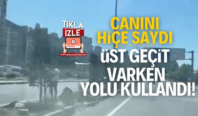 Canını hiçe saydı! Üst geçit varken yoldan geçti