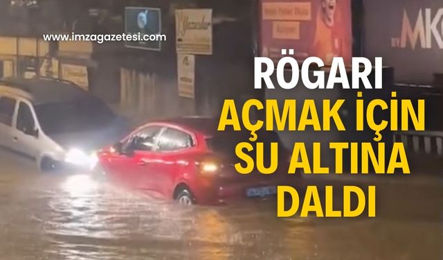 Rögarı açmak için su altına daldı! Yok artık