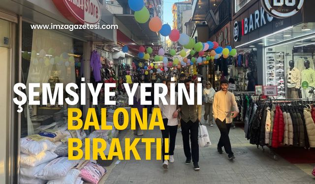 Şemsiyelerin yerini balon aldı!