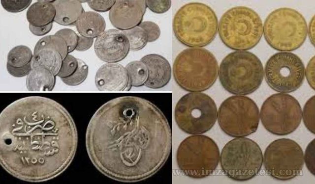 Eskiden bazı paraların ortasında neden delik vardı?