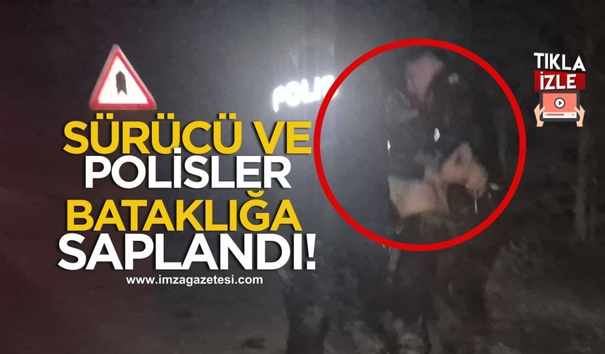 Sürücü ve polisler bataklığa saplandı!