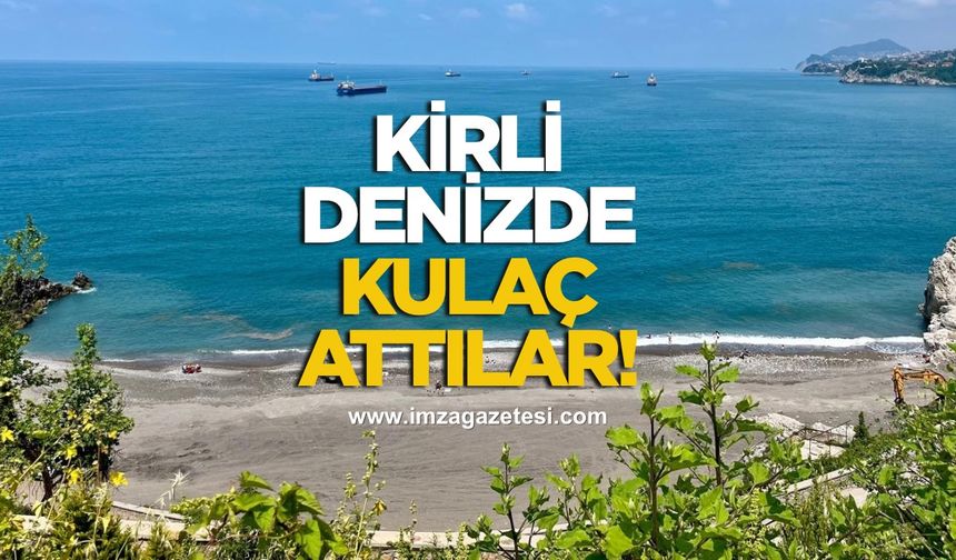 Zonguldak’ta kirliliğe aldırış etmeden kulaç attılar!